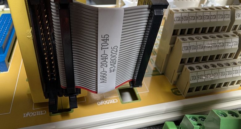 FANUC I/O backplane with ribbon cabling and field terminal blocks